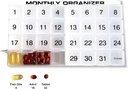 31 compartments, 1 per Day, 4 Week Monthly Pill Organizer by Promed. Includes Tray and 8 Removable compartments. (White) 5